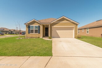 Building Photo - 15697 Saddled Charger Dr