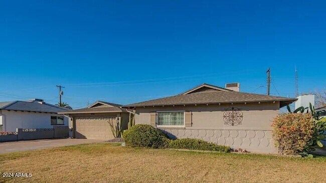 Building Photo - 6426 E Wilshire Dr