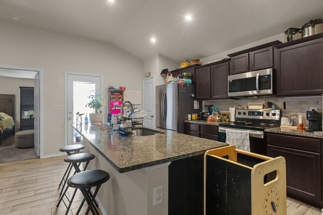 Building Photo - 9008 Rice Ave