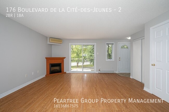 Photo du bâtiment - Charming 2 Bedroom End Unit Condo