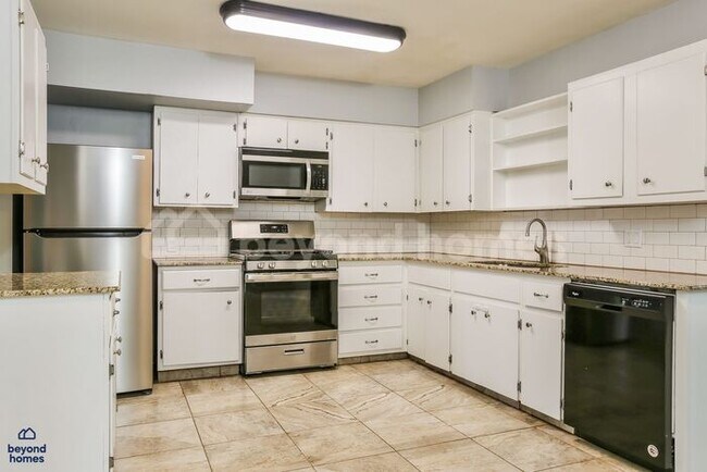 Building Photo - Charming 3 BR Brick Home with Upgraded Kitchen, Stone Fireplace & Sunroom in Little Rock