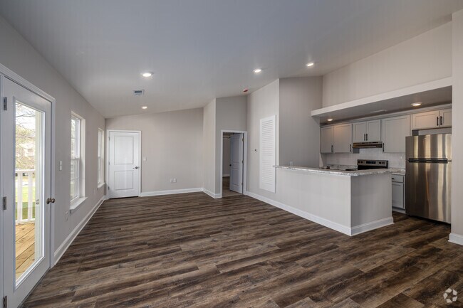 E2 2BR, 2BA - 1,120 SF - Living Room - Spring Meadow Apartments