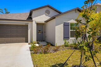 Building Photo - 5230 Fiddle Fig Ave