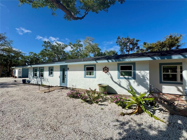 Building Photo - 7372 Melaleuca Way