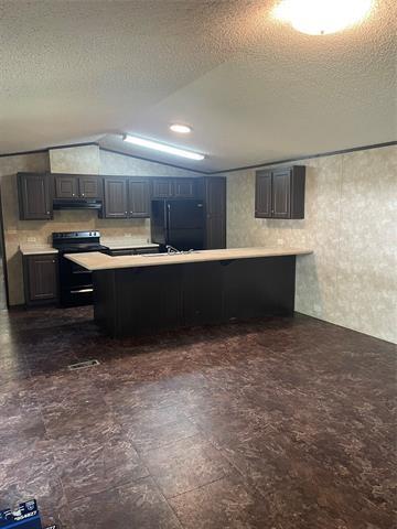 Foto del edificio - 6000 Spring Creek Pkwy