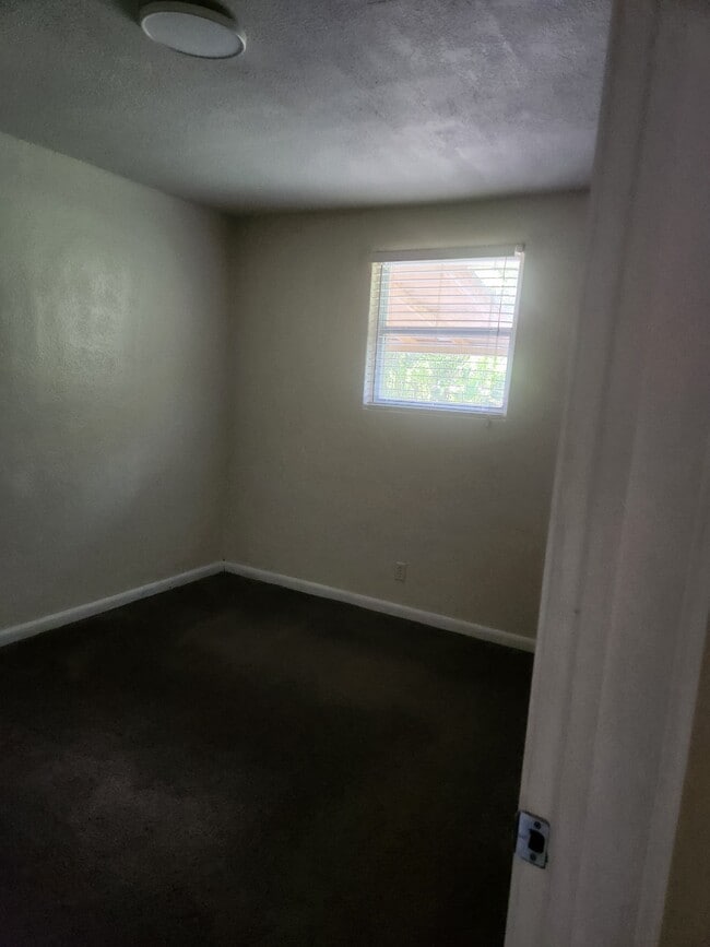 Building Photo - 6945 Woodley Dr