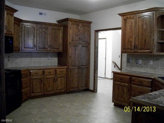 Foto del edificio - 20801 E 50th Terrace Ct S