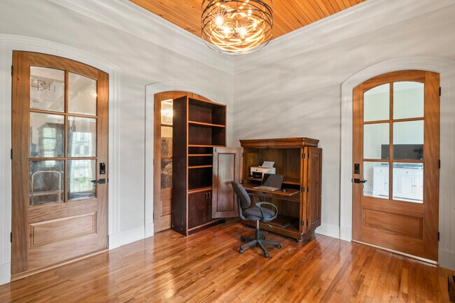 Shared Entry-foyer with interior locked door into apartment with work desk and printer/scanner - 305 E 14th Ave