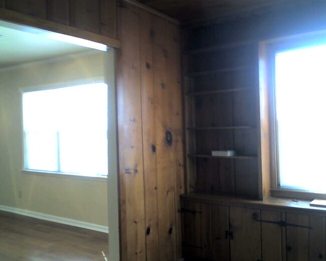 living room/knotty pine sunroom - 119 E 26th St