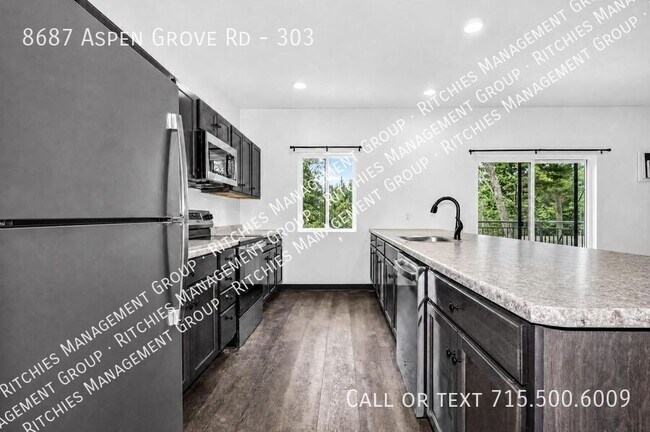 Building Photo - 8687 Aspen Ln