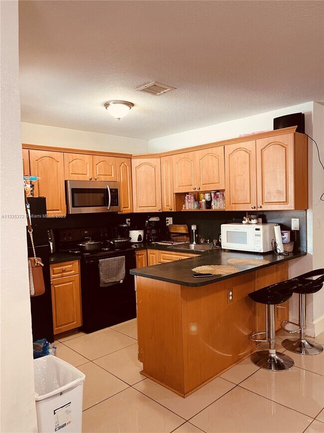 Foto del edificio - 5857 NW 13th Ave