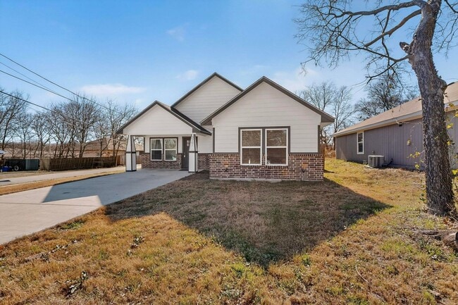 Building Photo - Bright Corner Lot Home with Open Living and Island Kitchen