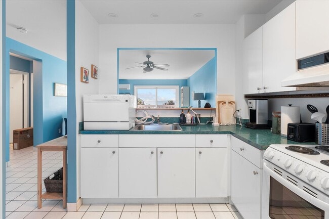 Building Photo - Wake Up to Ocean Views – Fully Furnished 2BR/1BA Condo Available for 1-Year Lease!