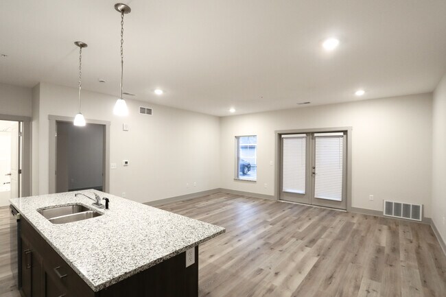 Cocina/Sala de estar - Mona Shores Flats