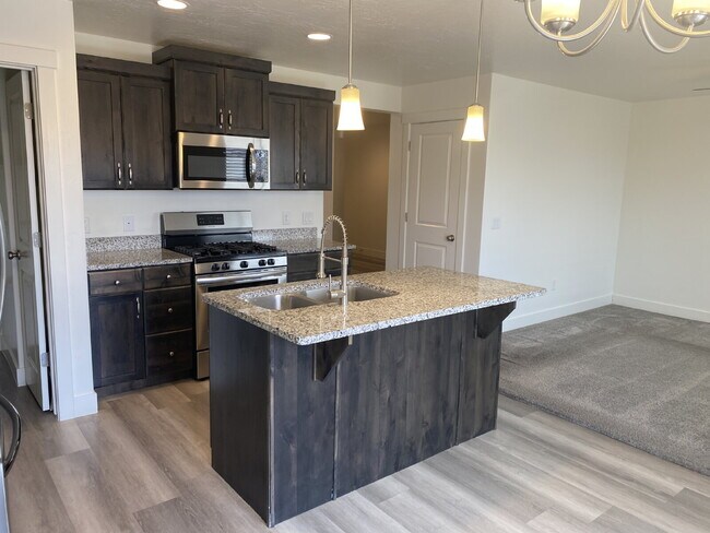 Building Photo - "Spacious 4-Bedroom Townhouse Retreat on S...