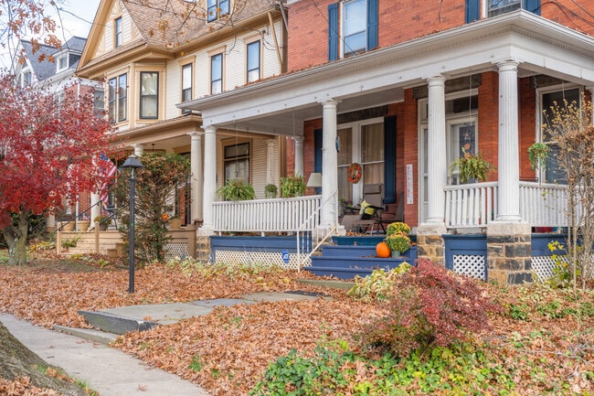 The cozy entrances to Traditional American homes have welcoming seasonal comfort.