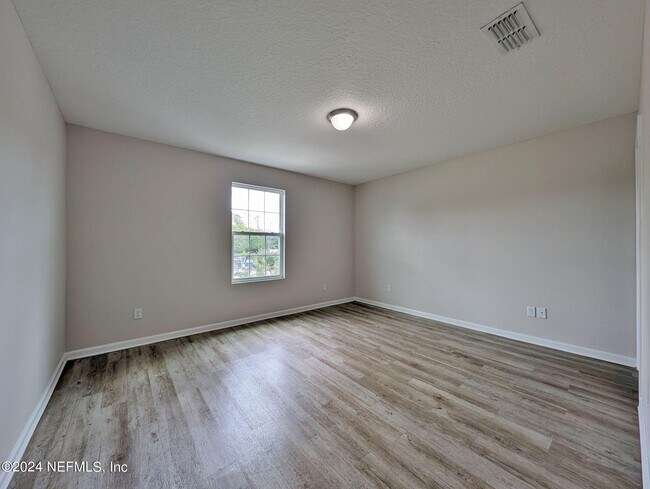 Building Photo - 8470 McGirts Village Ln