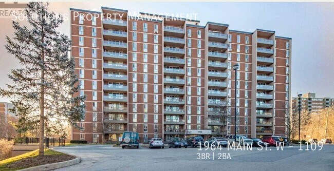 Photo du bâtiment - **Bright & Spacious 3-Bedroom, 2-Bath Condo with City Views**