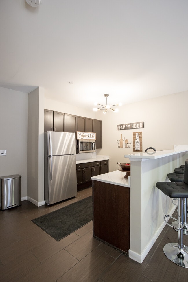 Building Photo - The Quad Apartments