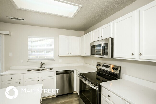 Foto del edificio - 5706 N Plymouth Ct