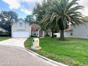 Building Photo - 5458 Hidden Gardens Dr