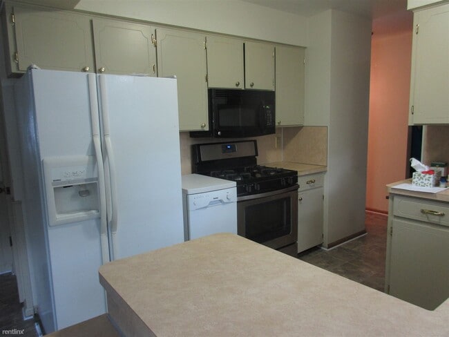 Building Photo - 4 br, 2.5 bath House - 6855 Bonnie Ave SE ...
