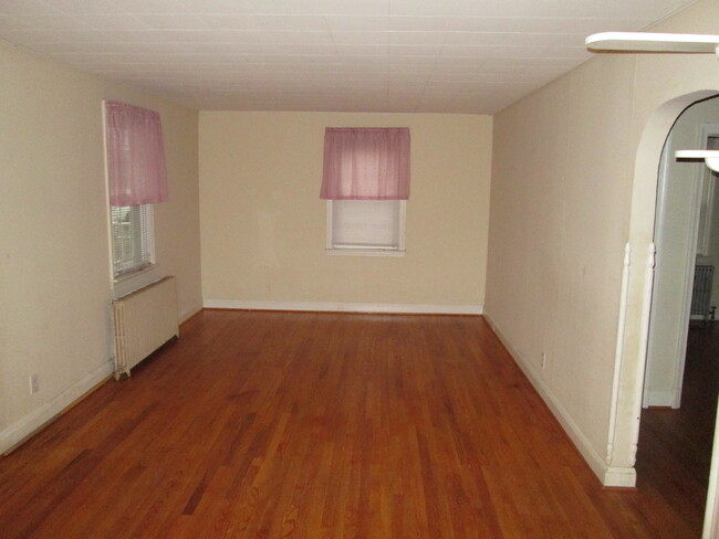 Building Photo - Charming Three-Bedroom Cape Cod-Style Dund...