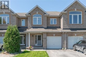 Building Photo - 106 Talltree Crescent