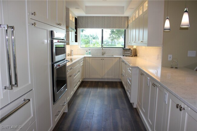 Building Photo - 6760 Pelican Bay Blvd