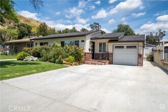 Building Photo - 7768 Shadyspring Dr