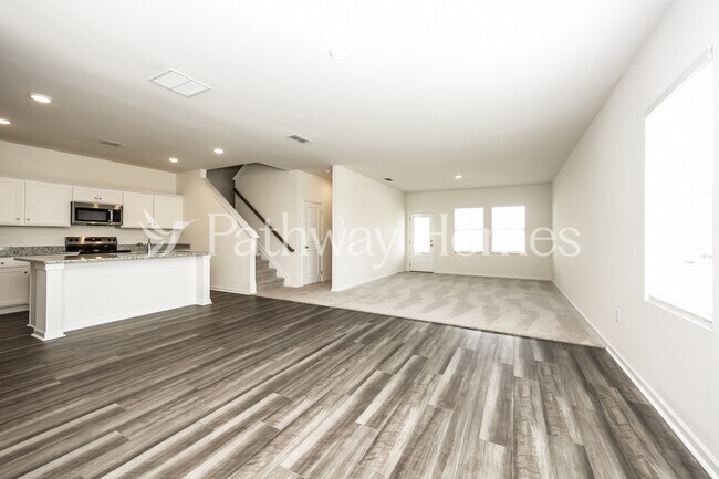 Building Photo - 202 Wild Daisy Wy