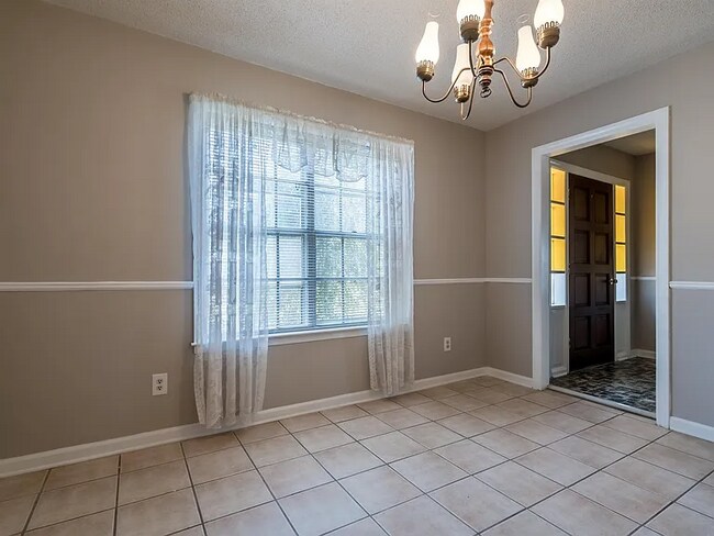Foto del edificio - 5714 Sleepy Woods Cove