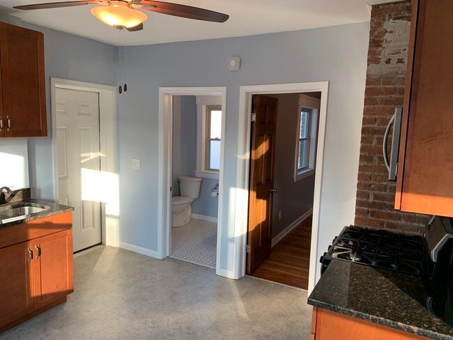 Kitchen - Apartment entrance, bathroom door, bedroom 1 door - 3817 Lorain Avenue