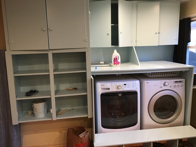 Washer and dryer conveniently located in the kitchen - 4335 Baker Ave NW