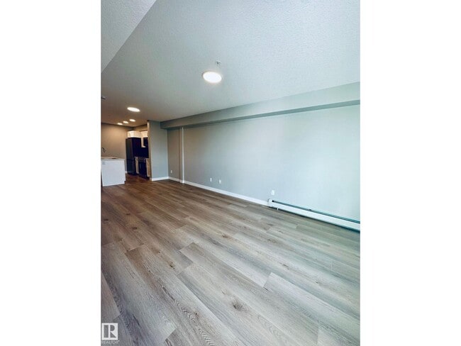 Building Photo - #320 1506 TAMARACK BV NW