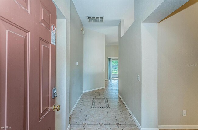Building Photo - 4 br, 2 bath House - 11407 R Coconut Islan...