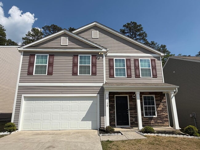 Foto del edificio - "Charming 3-Bed Oasis on Finnigan Rd: Spacious 1,994 Sq Ft with Granite Kitchen & Cozy Fireplace!"