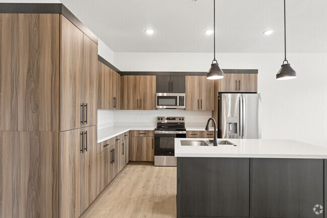 2 habitaciones, 2 baños - 1208 pies cuadrados - Cocina - Elara at Holladay Crossing