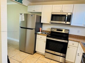 Building Photo - 8110 Sunrise Lakes Blvd