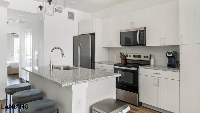 Building Photo - 6525 Ed Bluestein Blvd