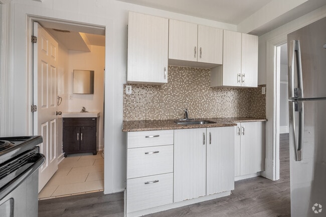 4 chambres, 2 salles de bain - Cuisine - Carlyle Apartments