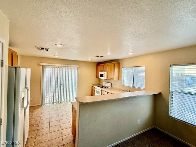 Building Photo - 8767 W Firecracker Ct