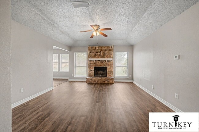 Building Photo - Cozy 3/2 Burleson Charmer | Wood-Burning Fireplace | 2-Car Garage | Pet-Friendly