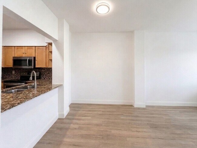 Building Photo - 3-bedroom + den, 2-bath condo at The Tides at Pelican Landing