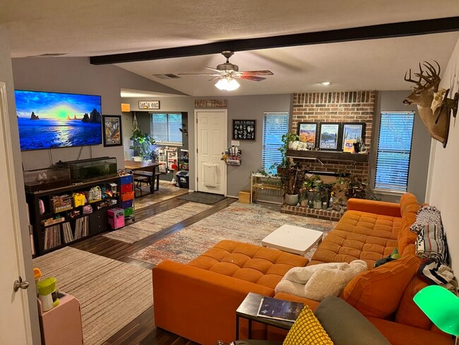Living area with fireplace - 9802 Briar Ridge Dr