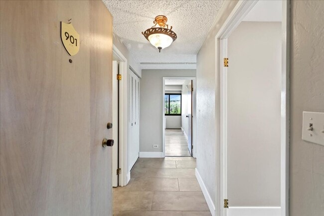 Building Photo - Stylish Imperial Plaza Condo in Prime Downtown Location