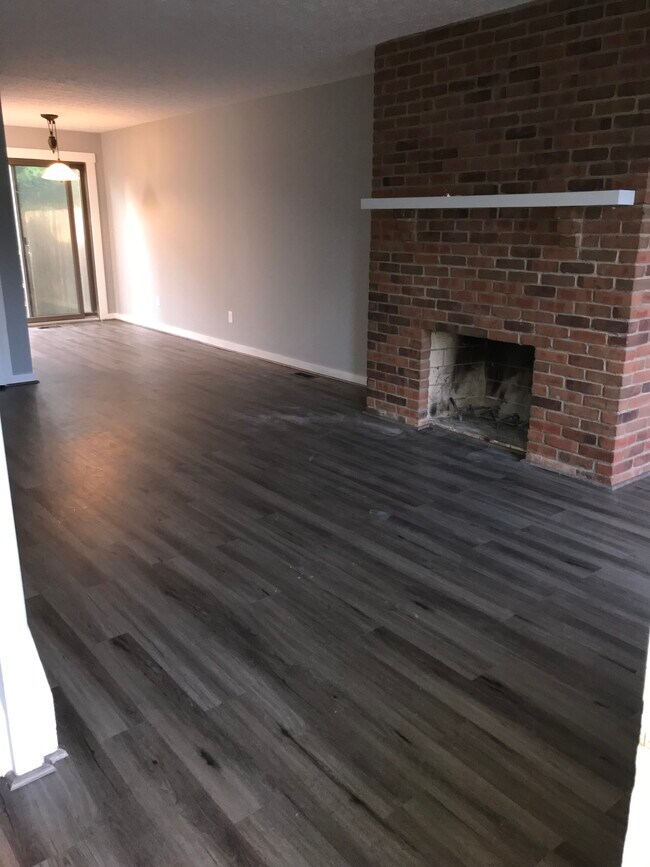 Living Room w/ Fireplace - 448 Edinburgh Rd
