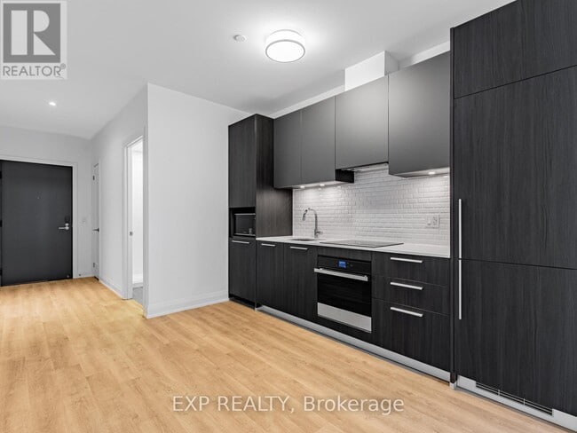 Building Photo - 65 Broadway Ave