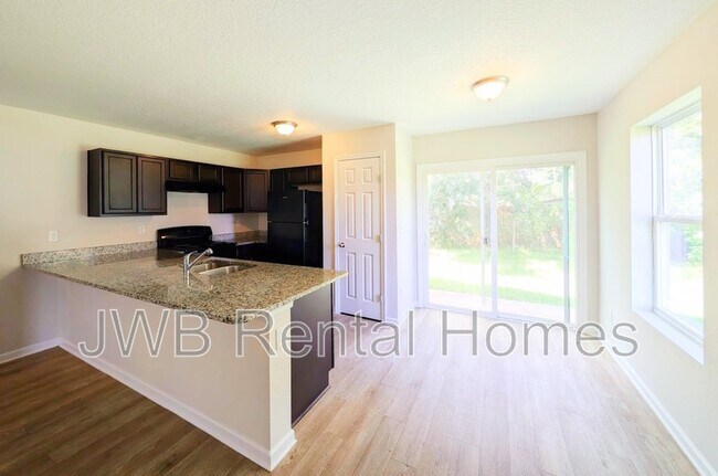 Foto del edificio - 6805 Lake Mist Ln
