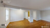Located at 1000 N Duke St in Durham, NC, this two-story, 3-bedroom, 2-bathroom home offers a functional and comfortable layout spread across two floors. The main level features a combined living and dining area filled with natural light from multiple windows, warm hardwood flooring, and crown molding accents that add a classic touch. The kitchen is outfitted with white raised-panel cabinetry, dark laminate countertops, a double sink, and white appliances, all complemented by hardwood floors. A dedicated laundry area and utility room add everyday convenience on this floor. Upstairs, three bedrooms provide ample living space, each featuring hardwood floors, natural light from windows with blinds, and generous closet storage — including large bi-fold closets. The primary bedroom offers a comfortable footprint well-suited for a full bedroom suite. Two full bathrooms serve the home, each featuring tile flooring, a tub-shower combination with white tile surround, and chrome fixtures. Hallways on both levels connect the spaces efficiently, and with five closets throughout, storage is plentiful. The home's neutral palette and clean finishes create a bright, move-in-ready atmosphere throughout.